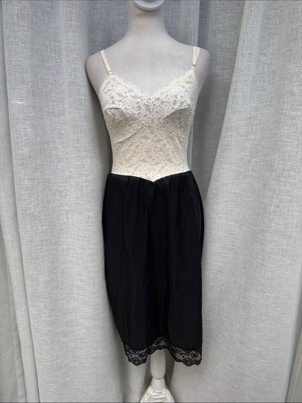 vintage two-tone full slip featuring an ivory floral lace bodice paired with a c